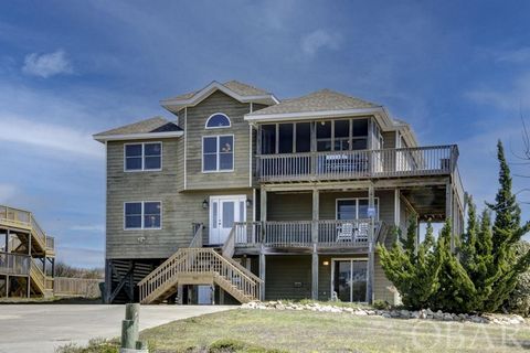 Experience the Perfect Oceanfront Retreat! Generating over $200K in rental income, this rental house is a dream w/ everything a rental house needs! Boasting 6 bedrooms including 2 primary bedrooms on the top level, a spacious open great room with bre...