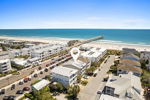 Top floor Wrightsville Beach furnished condo with ocean views offers a perfect blend of coastal charm & modern luxury nestled between the Banks Channel Sound & the Atlantic Ocean. Offering the quintessential coastal living experience steps away from ...