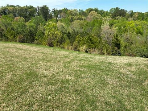 Beautiful residential lot with breathtaking panoramic views of the North Georgia Mountains. Ready to build cul-de-sac lot with all utilities at the street. Located at Iris Park in Canton.