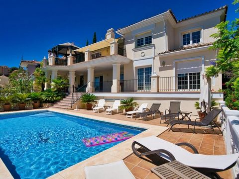 Beautiful frontline golf Villa in Santa María Golf, Elviria. Villa on three levels: On the middle lever there is a large fully fitted kitchen, spacious dining area with the access to the terrace with a corner pergola area from where you can enjoy gol...