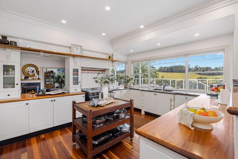 Nestled in the lush hills by Merricks Creek, this stunning estate offers a five-bedroom house, studio, and renovated Barn, making it the ultimate rural getaway in Mornington Peninsula. As you drive through the tree-lined path with remote gates, the m...