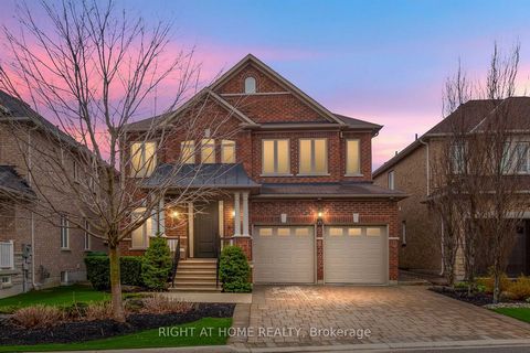 Welcome to 15 Via Borghese, Where Luxury Meets Functionality! This Meticulously Maintained Residence Located in The Sought After Vellore Village Boasts 9 Ft Ceilings on Every Floor and Attention to Detail Throughout! The Main Floor Features a Large L...