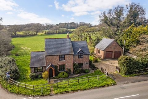 West Holme Cottage offers breathtaking countryside views and oozes character and charm. Featuring a spacious garden and potential for a garage conversion (subject to planning permission), this four-bedroom detached house is a rare find just a short d...