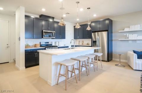 Monument at Reverence is Pulte's newest all two-story luxury gated townhome community situated in west Summerlin. The community is elevated above the Las Vegas valley with nearby outdoor amenities. The Branton floorplan boasts comfortable and conveni...