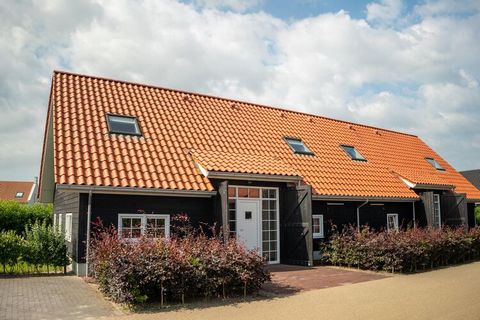 This detached, luxurious holiday home is located at Strand Resort Nieuwvliet-Bad, a spacious holiday park in the beautiful province of Zeeland. This attractive getaway is three kilometres from the centre of Nieuwvliet, and the delightful North Sea be...