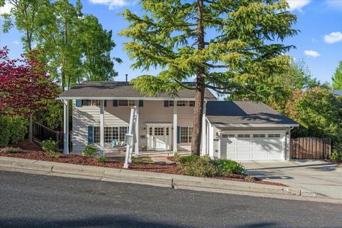 Welcome to this beautifully remodeled Belwood home with Valley & City Light views. Formal entry with stone tile floors. Formal living room. Formal dining room with access to the backyard. Gourmet chef's kitchen with custom white glazed cabinets, larg...