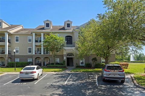 FIRST FLOOR 3 BED/2 BATH!! Condo living in the gated resort-style community of Mosaic, located near the Millenia Mall. Perfect for both primary residence or investment, ground floor unit boasts a spacious living room, dining room, fully equipped kitc...