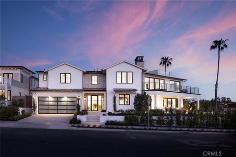 Discover the ultimate in seaside sophistication at this brand-new custom home by Stonefield Development, featuring ocean and city light views in San Clemente. Prominently positioned on a corner lot with approximately 100 ft of wide frontage, this pro...