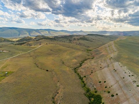 The sellers will carry owner financing on this property! The property has a total of over 128 acres of land that historically has been used for grazing purposes for cattle and or sheep, and offers the potential of being developed into homesites for f...