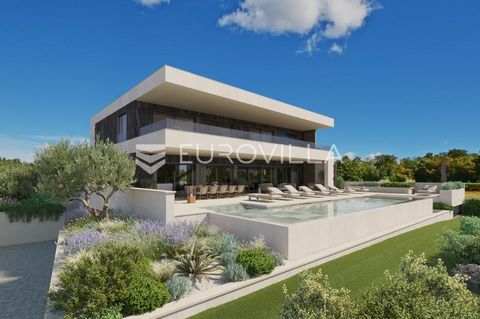 Not far from Poreč in Kaštelir - Labinci is this unique villa with a panoramic view. Superior design, content and quality make the villa unique. It is spread over 3 floors: basement, ground floor and first floor, where you can easily move with the bu...