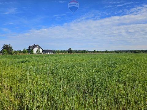 We present to you a wonderful, large building plot in Zendek, Ożarowice commune. The plot has access to sewage, water, electricity and fiber optics. The first new houses have already been built in the area. It is located near the airport, but the lay...