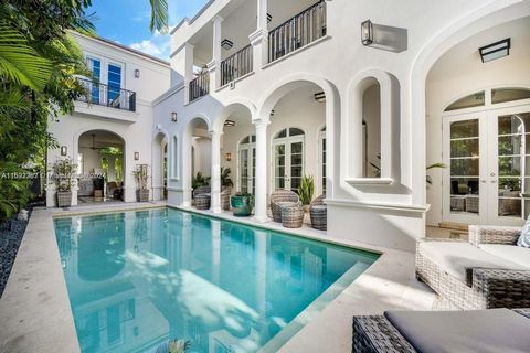 Sellers motivated just reduced for a quick sale Stunning Mediterranean home located in the gated community of Altos Del Mar on Miami Beach comprised of 22 lots only. just steps from the sand. This pristine villa boasts 4bdrms 4.5 baths including a gu...