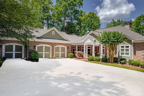 Meticulously maintained lakefront home in pastoral Waters Edge Subdivision on Lake Oconee. From the moment you enter the gates of this exclusive community you'll be captivated. This custom brick lakefront beauty is privately nestled on almost 1 acre,...