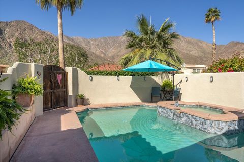 Welcome to the coveted Yucatan Cove located blocks from Old Town La Quinta, Trails, Pickelball and more! As you step through the arched entryway, you're greeted by a courtyard adorned with vibrant desert flora, setting the tone for the natural beauty...