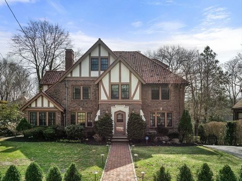Nestled on the serene Valentine St in West Newton Hill, this exquisite brick Tudor with tile roof sits on 16,000+ sqft lot. Offering 6 spacious bedrooms and 3.5 baths, this home combines classic charm with modern sophistication. First floor greets yo...