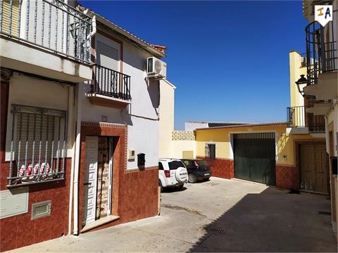 Semi-detached house located on a corner of Calle San Miguel in the center of the popular town of Cuevas de San Marcos, in the Malaga province of Andalucia, Spain, close to all shops, bars and restaurants. The entrance of the property leads to a utili...