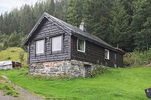 Cozy older holiday home in old style, modernized in 2019. Final cleaning is included in the price. The holiday home has a separate kitchen and wood burning stove in the living room. International TV channels via Astra1. A bedroom with family bunk bed...