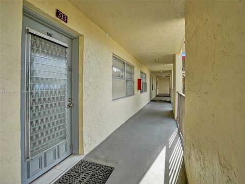 FULLY REMODELED CONDO IN CYPRESS CHASE! SENIOR LIVING 55+ COMMUNITY. THIS 2 BEDROOM 2 BATHROOM UNIT HAS BEEN REMODELED! UPDATED KITCHEN FEATURES STAINLESS STEEL APPLIANCES, BATHROOMS UPDATED WITH STYLISH RENOVATIONS, ENCLOSED PATIO OVERLOOKING THE PO...