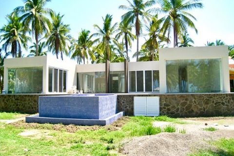 House for Sale in Bahia de Banderas Nayarit This beautifully built house is located in the prestigious community of Playa Las Tortugas Zacualpan in Nayarit. Steps from a pristine beach stretching 11 miles 18 kilometers of golden sand fringed with coc...