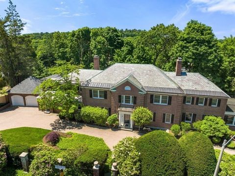 Fisher Hill elegant brick Georgian Colonial is located on almost an acre of land, gated and set back from the street, surrounded by lush mature landscaping, beautiful heated spa & heated circular driveway.The expansive first level features oversized ...