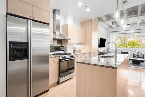Welcome to the epitome of urban chic living, a charming urban retreat nestled in the heart of the vibrant Midtown neighborhood. This sophisticated condo offers a perfect blend of modern convenience, industrial charm, and a central location. This one ...