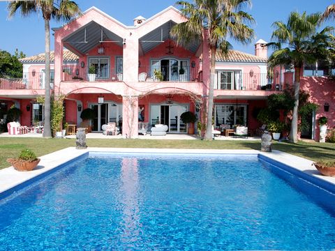 An impressive south facing frontline beach five bedroom villa in undoubtedly one of the best areas in Guadalmina Baja, just meters away for the beach and within five minutes drive to both San Pedro and Puerto Banus. Imposing wrought iron gates open o...