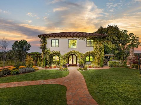 Escape to your own slice of Napa Valley in El Dorado County! VILLA REGALE, a Tuscan inspired estate nestled behind private gates on 5 acres surrounded by 3 acres of beautiful vineyards with an array of Syrah, Cabernet Sauvignon, Viogniers, Sangiovese...