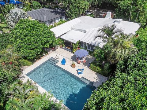 Welcome to this exquisite house in Coral Gables! This stunning 3-bed, 2-bath residence exudes elegance and allure. Featuring spacious living areas, a beautiful foyer, a brand new gourmet kitchen, recently renovated bathrooms, and a radiant sunroom, t...