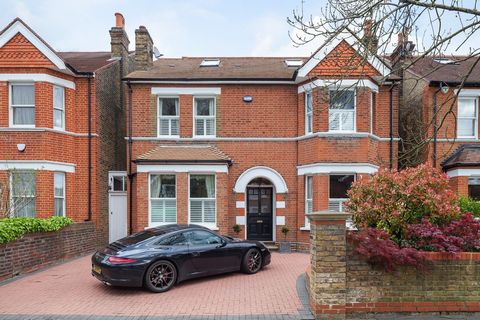 This five-bedroom detached property is a stunning example of period architecture, spread across three spacious floors. The forecourt offers ample parking for multiple cars, leading to the inviting main entrance. The property boasts a charming and sec...