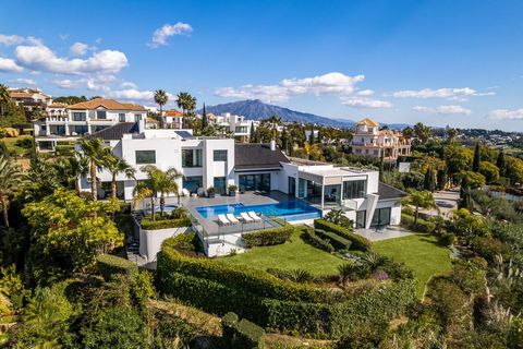 This high-quality, luxury modern villa is offered for sale in the prestigious Los Flamingos Golf Resort, Benahavis. It is only a few minutes' drive from the excellent shopping areas and chic Puerto Banus, and less than 3 km from the sea and sandy bea...
