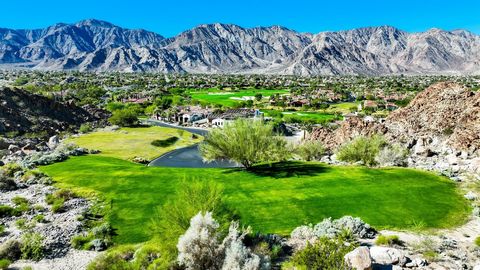 This is THE preeminent parcel at Tradition and possibly all of La Quinta. Situated high above it all at the toe of the slope of the Santa Rosa's, this is the prized ''King Of The Hill'' parcel. Spectacular and nearly one acre in size, this home site ...