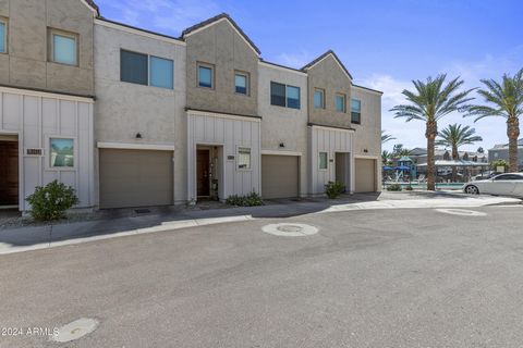 This stunning townhome, located in Phoenix, is nestled within a beautiful gated community, offering the perfect blend of convenience and charm. As you step into this meticulously crafted home, built just a couple of years ago, you are greeted by a be...