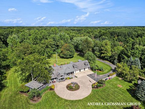 Introducing your exclusive equestrian estate nestled on 26 acres with three spacious pastures, two expansive ponds, a 70x200 indoor riding arena with a well-appointed stable, and outdoor riding arena. Immerse yourself in the tranquility of walking an...