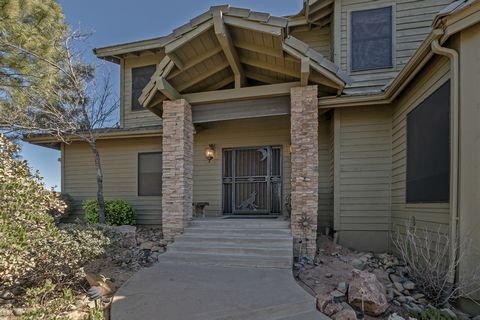 This lovely home is located on a hilltop in Gated Golf Community Chaparral Pines, offering unparalleled views of the Mogollon Rim, Diamond Point, and the Granite Dell Mountain range. Immerse yourself in the breathtaking beauty of morning sun rises fr...
