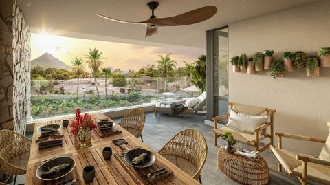 Live the Dream Between Sea and Mountain in this Tropical Jewel. Discover your personal oasis in Wolmar! 2 bedrooms, 133m² total, with pool, bar, and much more. Don't miss this opportunity. GADAIT International offers you a unique opportunity to inves...