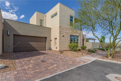 From the 215, take the Town Center exit, heading south to Trilogy's 24hr guard-gated community. This smart home, originally a model, is a two-story residence nestled in a private cul de sac. Featuring 2 bedrooms, an office, and 3 ½ baths, it boasts a...