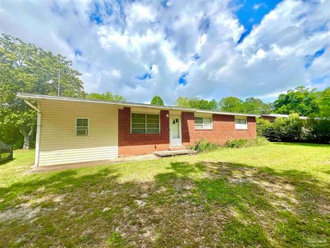 This charming 3 bed brick home sits on just over 1/3 acre on a corner lot with beautiful mature trees and landscaping. The home has been well loved for many years and is now ready for its new owner. The home welcomes you with beautiful hardwood floor...