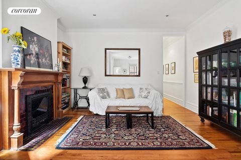 Discover tranquility in this charming one-bedroom apartment, just one flight up from vibrant Vanderbilt Avenue. The long hallway, ideal for displaying art or photos, leads to a stunning living room featuring high ceilings, crown moldings, and an orna...