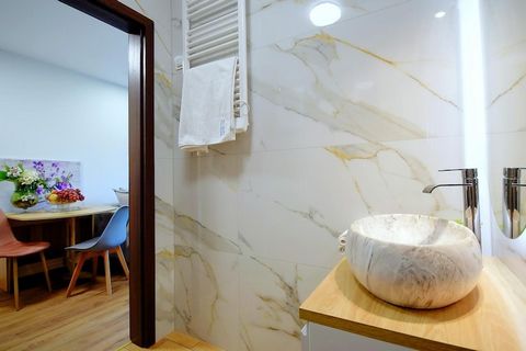 On the edge of a charming seaside settlement, there is a family holiday resort, which offers accommodation in two-story terraced houses and plenty of green space for children to play various games and have fun. Two-story holiday homes with terraces a...