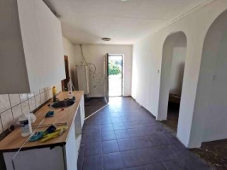 Price: €13.084,00 Category: House Area: 63 sq.m. Plot Size: 2959 sq.m. Bedrooms: 2 Bathrooms: 1 New price £11.451 This house, on an almost 3,000 m2 plot, needs a renovation. Last house in the street. This house needs a renovation but is structurally ...