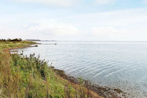 Holiday home located next to green area and only approx. 200 meters from the coast. Nysted has a child-friendly sandy beach at Skansen and an area with a bathing jetty. Nysted harbor has cosiness and charm with small fishing boats, yachts, ice cream ...