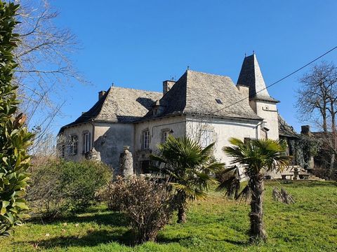 4km from Naucelle, from all its amenities and 6km from the Rodez-Toulouse expressway, Selection Habitat presents this superb 14th century stone mansion. With an outbuilding serving as a garage and a beautiful entrance with a majestic tree on either s...