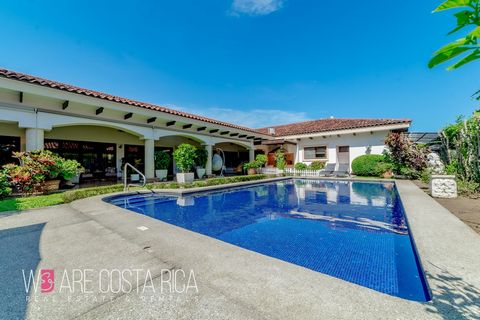 ID# 116827. Luxury house for sale in Santa Ana, Bosques de Lindora condominium, 910 sqm construction, 2.410 sqm land, 4 bedrooms, 4 baths, US$1.800.000. Nestled within the prestigious Bosques de Lindora condominium, an exclusive residential enclave i...