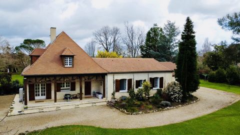 We are pleased to present this villa with its own tennis court, river access and swimming pool, surrounded by one hectare of parkland, in a quiet and private location just a short drive from the town of Bergerac. On the ground floor of this bright an...