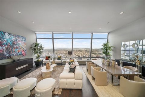 Immerse yourself in the epitome of luxury living with this Furnished 3-Bedroom Penthouse Condo perched on the esteemed 50th floor of The Ritz-Carlton Residences at LA Live. Marvel at the breathtaking panoramic views that greet you from every angle, s...