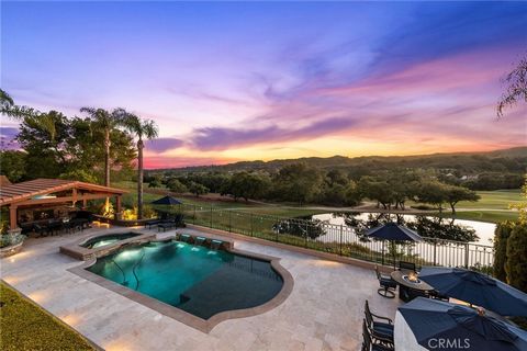 Nestled within the prestigious gated community of Coto de Caza, this magnificent residence at 35 Cherry Hills epitomizes luxurious living in one of Southern California’s most exclusive neighborhoods. As you arrive, a grand entrance and meticulously l...