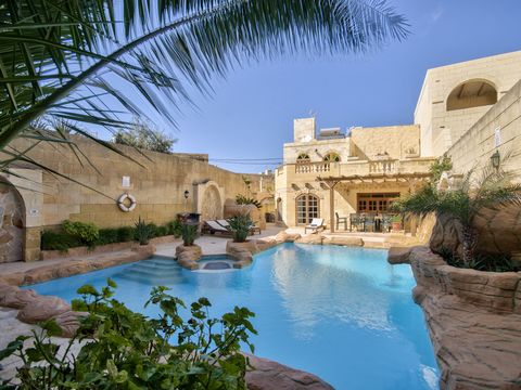 An exquisite expansive farmhouse awaits you in the heart of L Gharb an enchanting village nestled in the north western part of Gozo Island. Mere moments from the vibrant capital city of Victoria this property offers a seamless blend of convenience an...