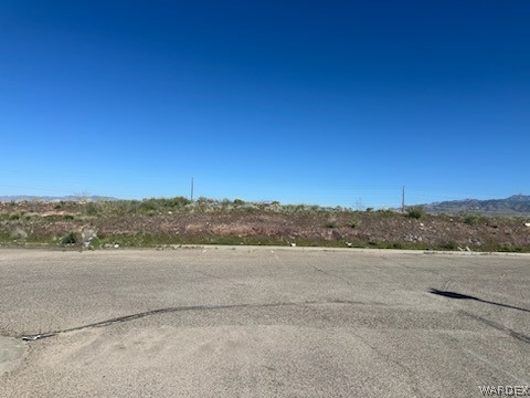 This C-3property is situated on a highly desirable main artery in central Kingman, this property benefits from high visibility and accessibility, being on the busiest street in the area. This is advantageous for attracting customers and clients. Vers...