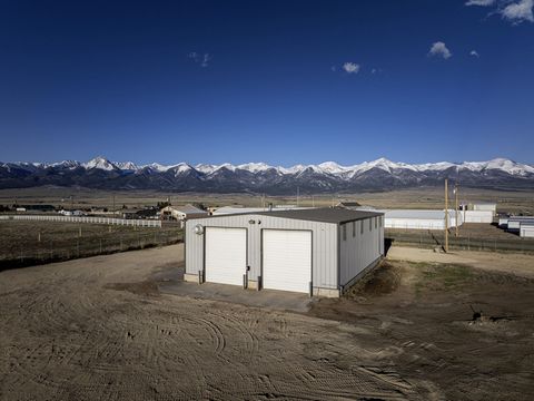 Commercial/Industrial building: Located in the vibrant Town of Westcliffe, this commercial building sits on a prime 1.95-acre parcel of land. The property benefits from a commercial well that produces an impressive 15 gallons per minute, a rare and v...