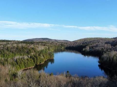 Beautiful 2.35 acres of waterfront land on a quiet lake. Gradual slope down to the water and a large flat level area at the top to build your dream home with an extraordinary view. Completed large and wide driveway. Safe shoreline with a gradual slop...
